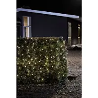 Konstsmide - Luci da fata a LED, con sensore di luce con interruttore on/off e timer di 6h e 9h, 120 diodi bianco caldo, a batteria, per esterni (IP44), cavo nero 4 x D 1,5V (escl.); 3729-100