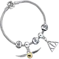 The Carat Shop Set Regalo Braccialetto Con 2 Ciondoli E 3 Account Harry Potter