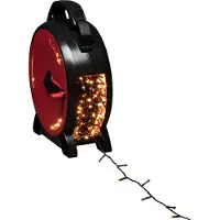 Konstsmide Micro LED con avvolgicavo, 1000 diodi color ambra, 30V, per esterni (IP44), cavo morbido nero - 3839-807