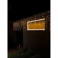 Konstsmide Barriera luminosa a LED per pioggia di ghiaccio, con globi bianchi, 400 diodi color ambra, 24V, per esterni (IP44), cavo trasparente
