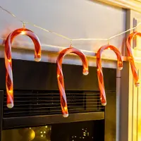 Inda Catena luminosa a LED a forma di bastoncini di zucchero, decorazione natalizia per interni, luce bianca calda, alimentazione a batteria, 40 LED, lunghezza 180 cm