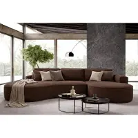 Sofello Divano angolare GUTTO MOLLY con forme arrotondate, rivestito in tessuto teddy color crema, beige e verde ruggine: un design moderno e accattivante! Novità 2025 (con funzione letto)