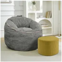 STILVORA Poltrona a sacco , ergonomica, dalla forma arrotondata e dotata di tasca portaoggetti; poltrona lounge con poggiapiedi cilindrico abbinato; poltrona da salotto per un comfort abitativo moderno