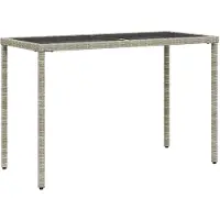 vidaXL Tavolo da giardino con piano in vetro grigio chiaro 115x54x74 cm in poly rattan