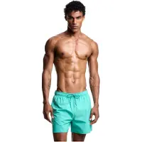 Emporio Armani per uomo. EM000583_AF20424 Costume da bagno turchese essenziale (S), Beachwear, Poliestere