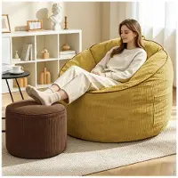 STILVORA Poltrona a sacco , ergonomica, dalla forma arrotondata e dotata di tasca portaoggetti; poltrona lounge con poggiapiedi cilindrico abbinato; poltrona da salotto per un comfort abitativo moderno