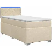 Syfax Letto con boxspring, materasso e illuminazione LED, colore crema, dimensioni 90 x 200 cm, rivestito in tessuto